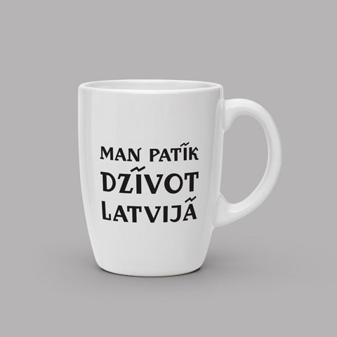 LV100 suvenīru krūzītes un iepakojuma dizains